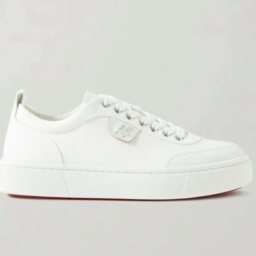 Christian Louboutin Ivory Sneakers with Red Accents